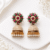 Ornate Ruby and Emerald Jhumka Earrings
