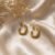 Twist & Gleam Gold Hoops